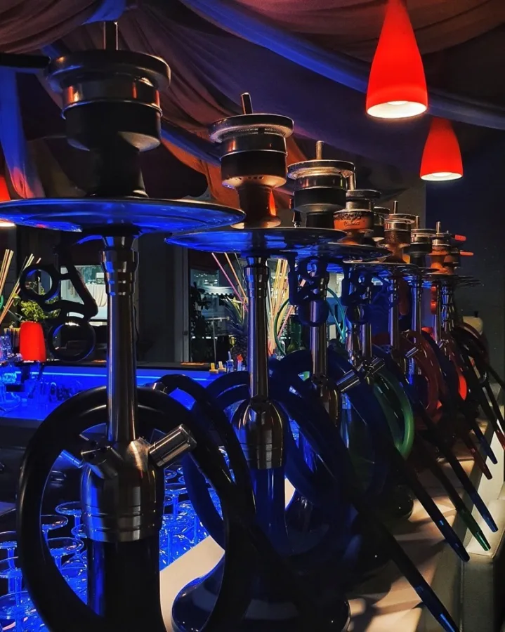 Maitai Club shisha area under blue light.
